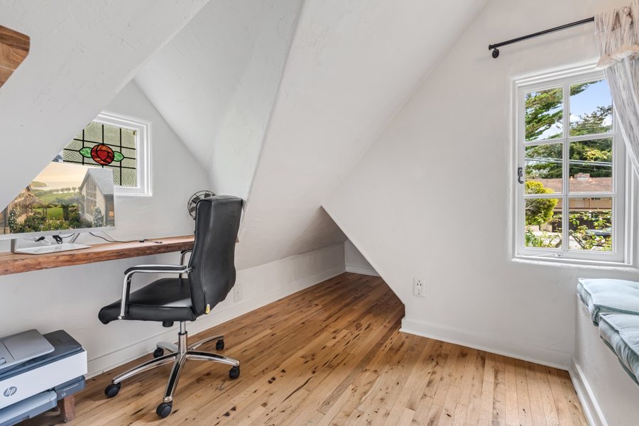 Dedicated office with stained-glass window at Twin Briar Cottage